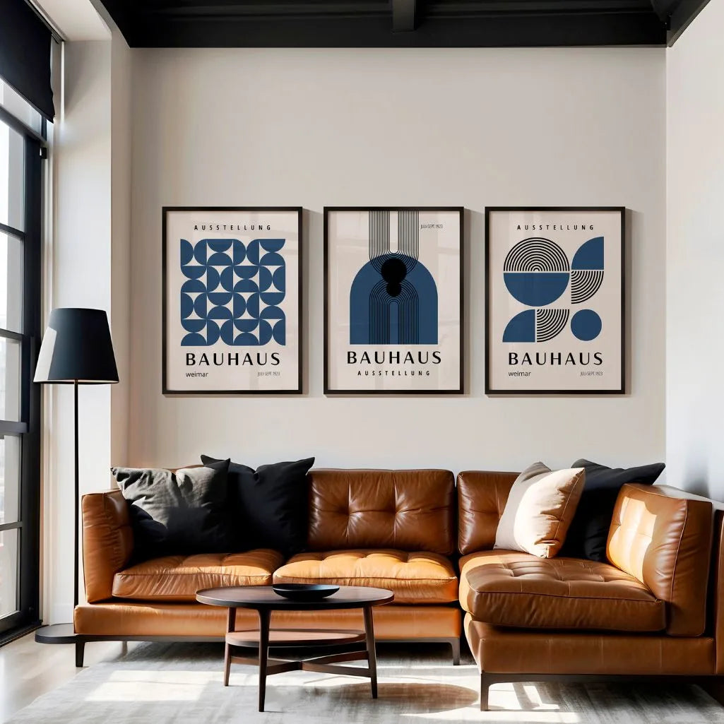 navy and cream geometric bauhaus poster set in contemporary office workspace
