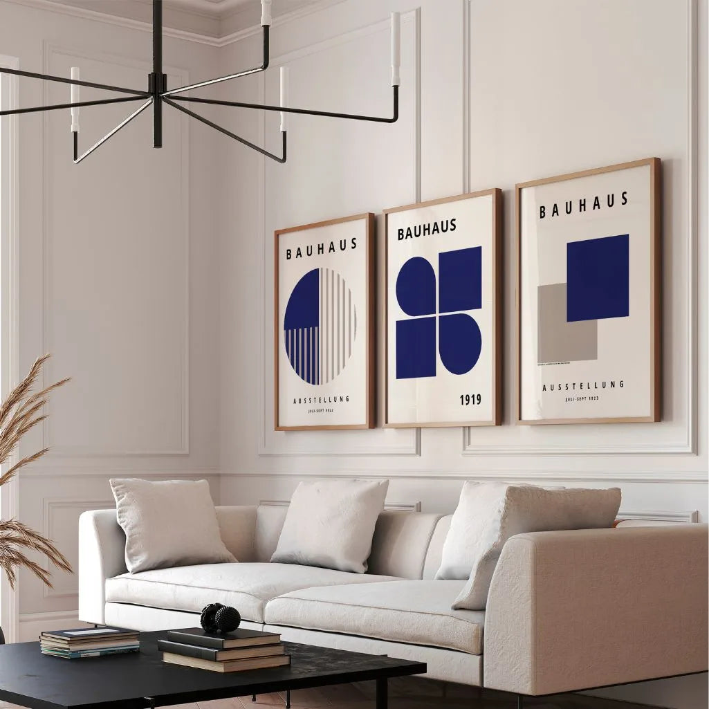 navy and beige geometric bauhaus poster set in contemporary office