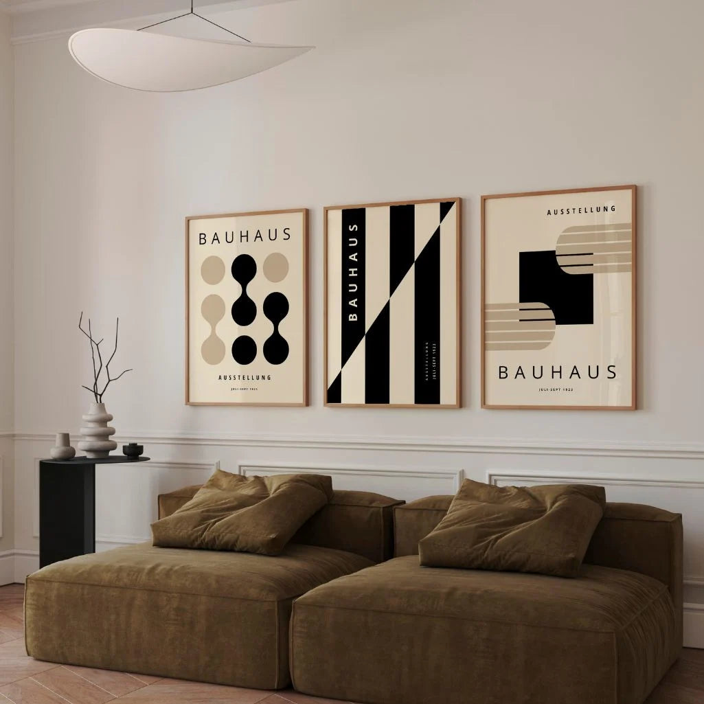black and beige geometric bauhaus poster set in contemporary office workspace