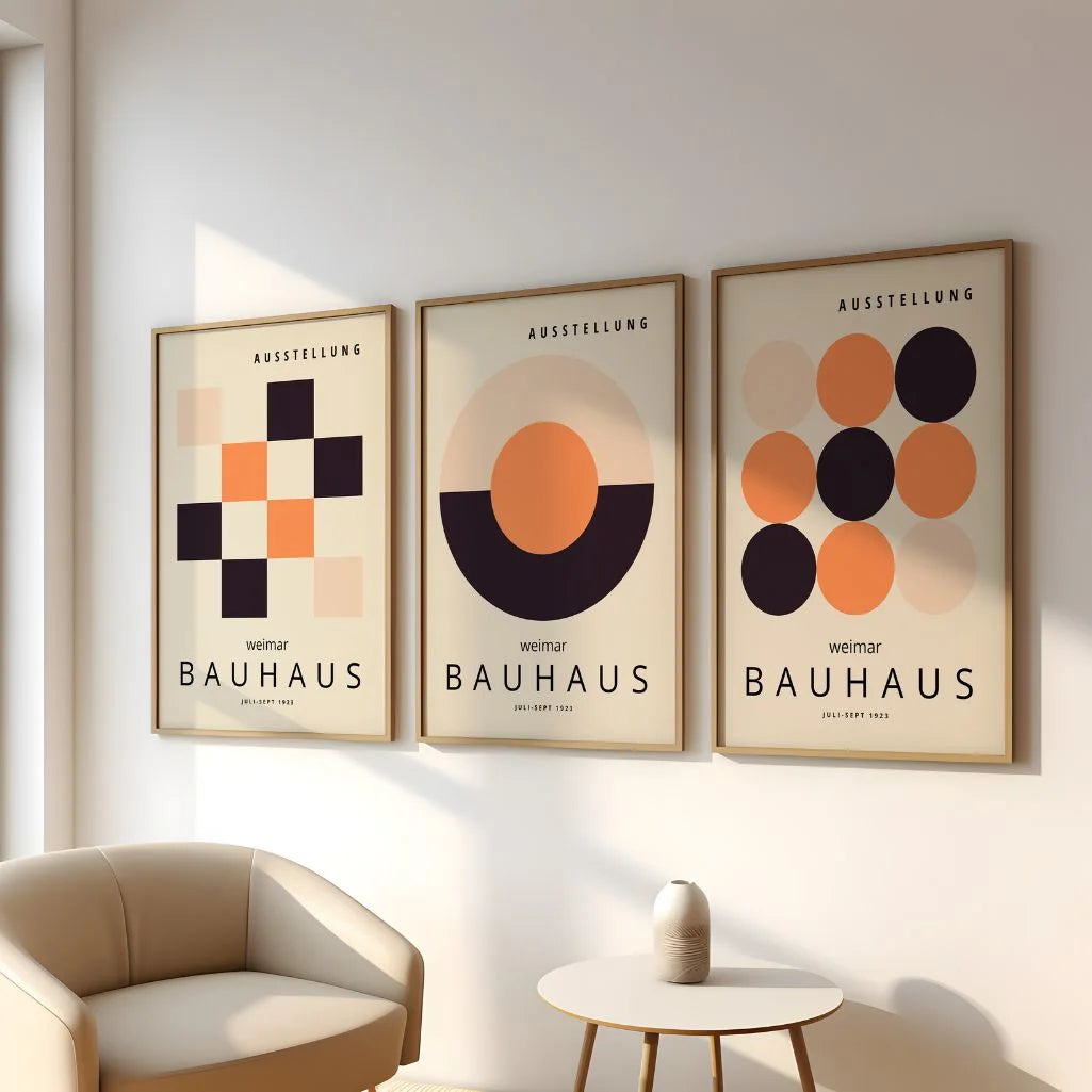 beige black and orange bauhaus poster set arranged in modern home gallery wall