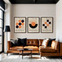 beige black and orange bauhaus wall art set in modern minimalist living room