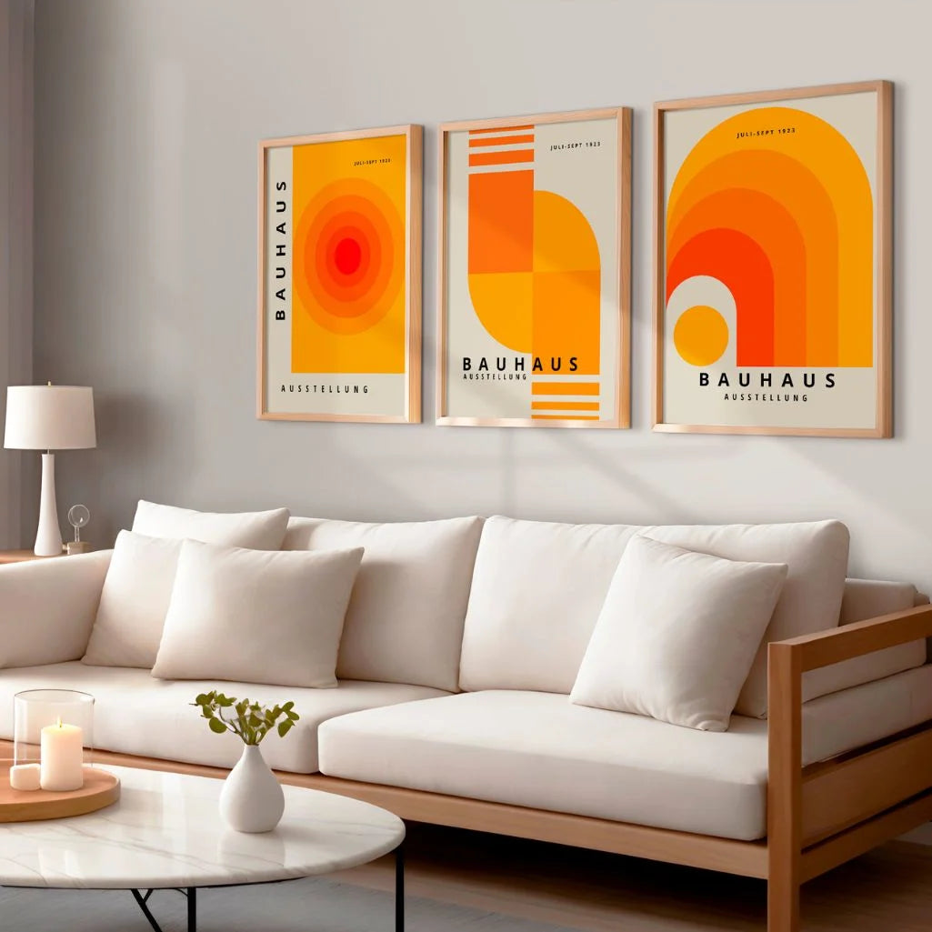 orange geometric bauhaus poster set in creative studio interior