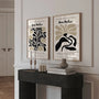 Close up of abstract flower poster set showing black and beige shapes