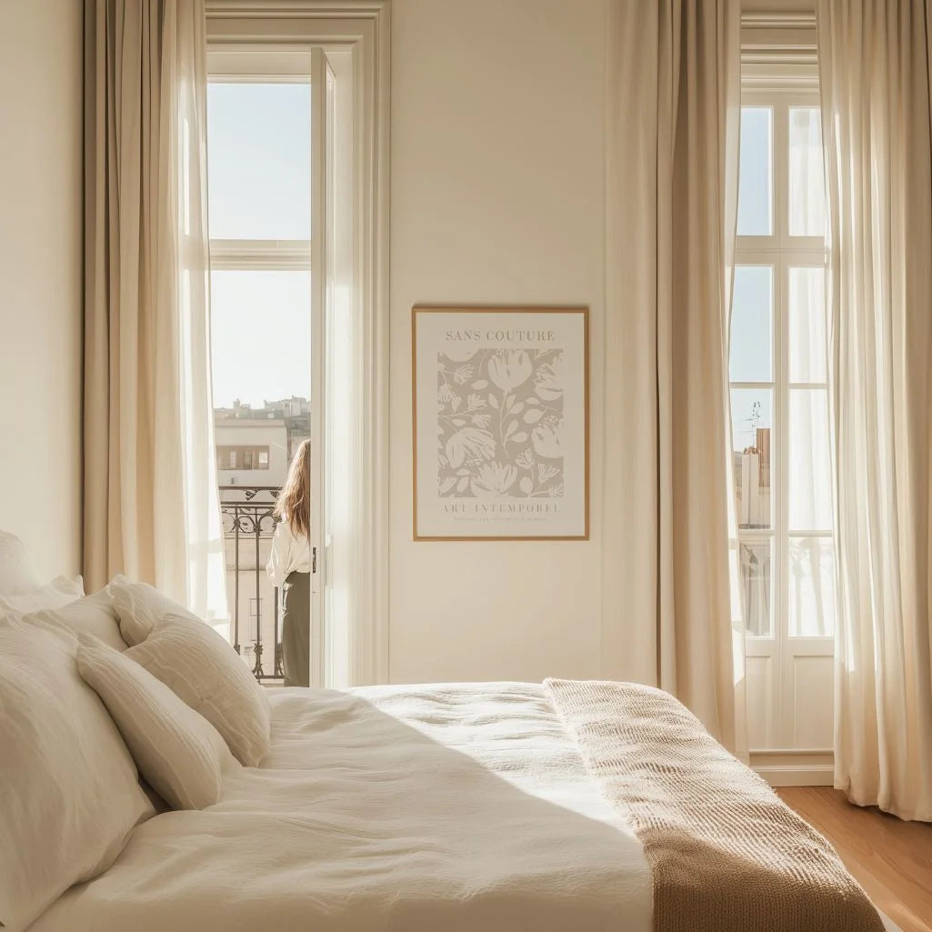 Minimalist floral beige poster displayed in gallery wall with modern neutral interior