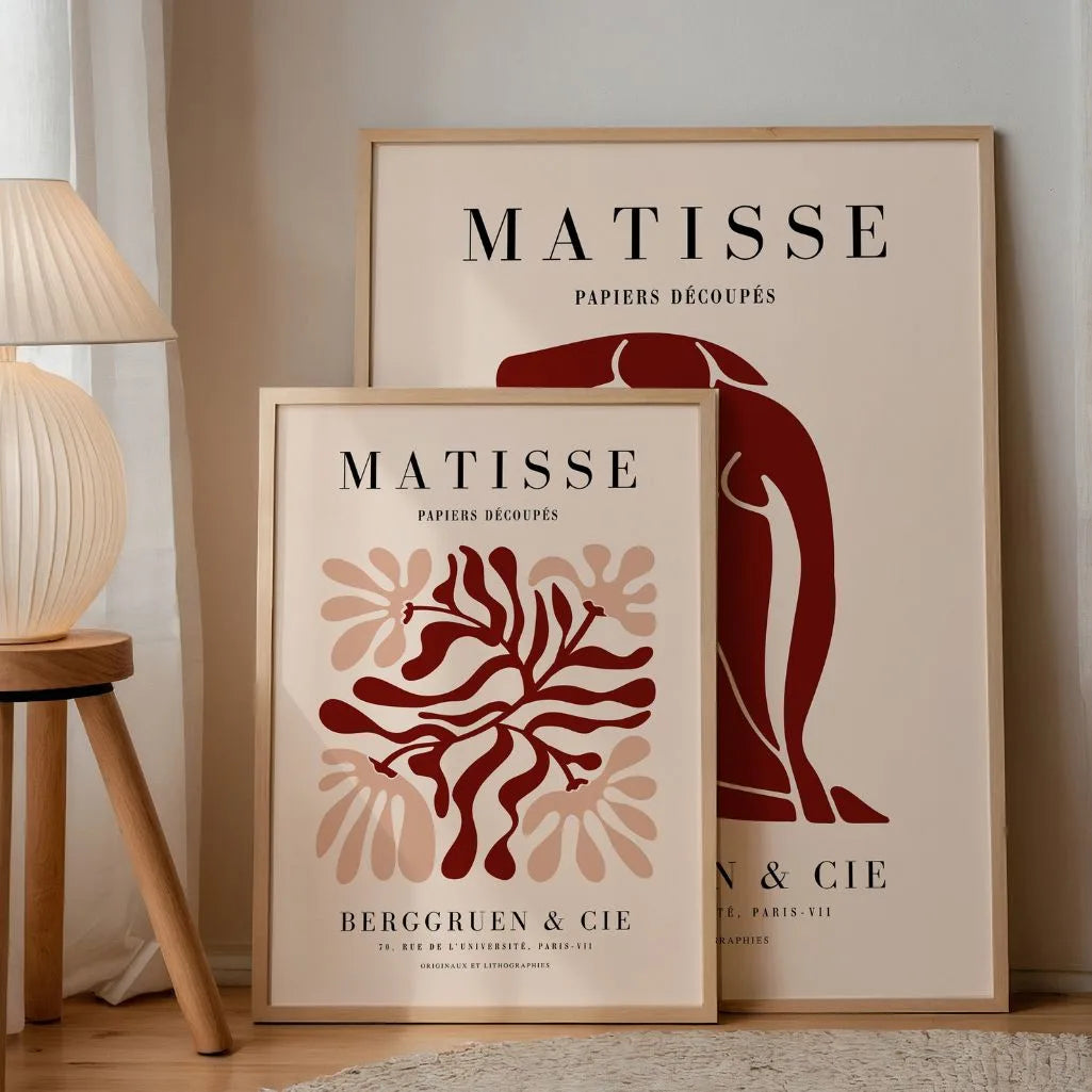 Set of 2 red abstract posters arranged as gallery wall in modern interior