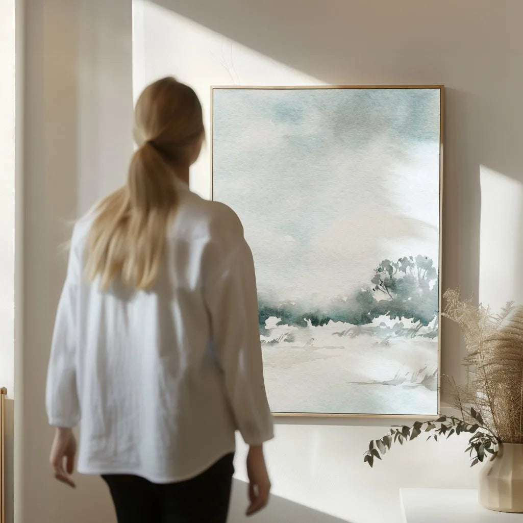 Winter snow landscape poster displayed in gallery wall with modern interior