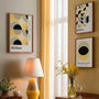 detail of yellow circles and balanced geometric composition on light background