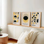 yellow bauhaus poster set arranged in modern gallery wall
